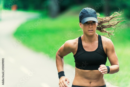 Jogging. Woman jogging outdoors