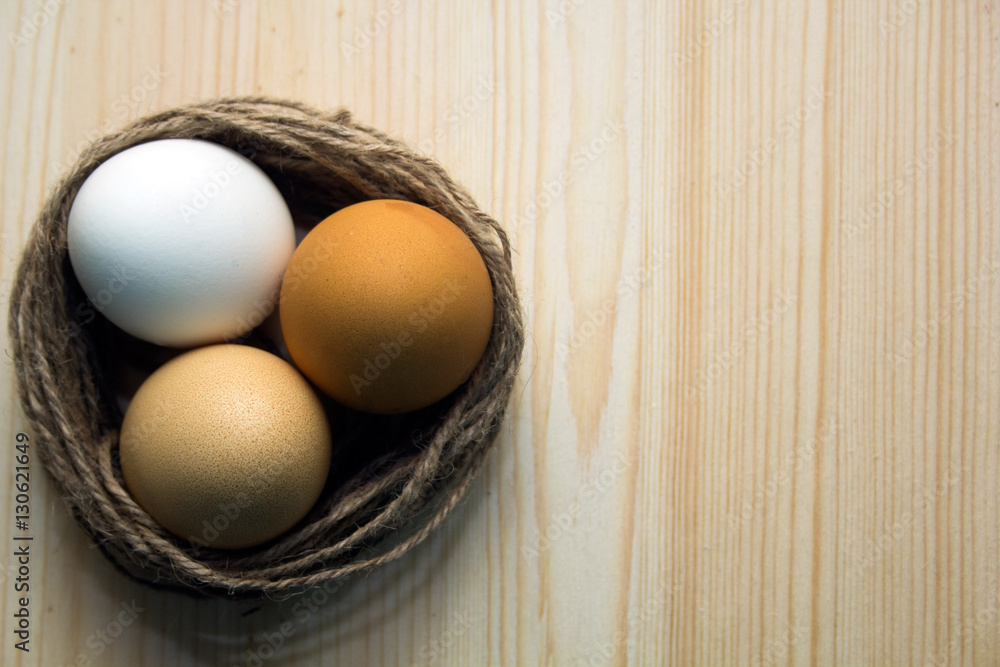 fresh eggs on a wooden background. Easter concept. fresh eggs on a wooden background. Easter concept.