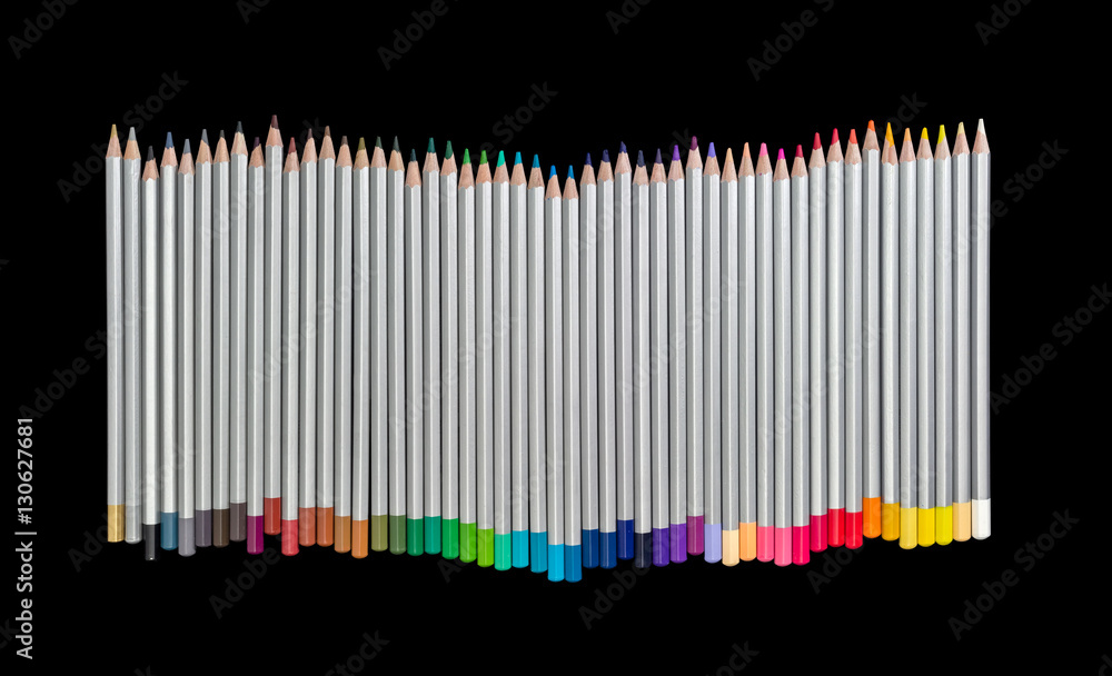 Set of colored pencils on a dark background Set of colored pencils on a dark background