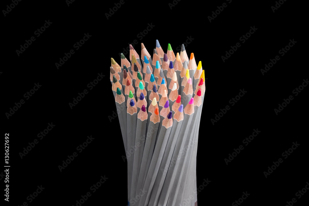 Bunch of colored pencils on a dark background Bunch of colored pencils on a dark background
