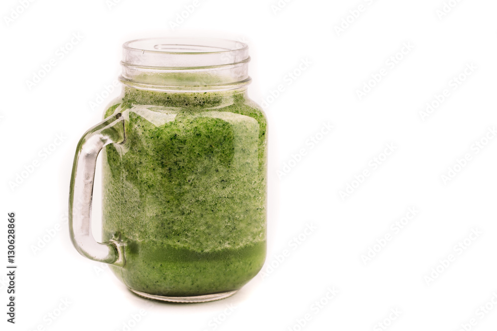Fresh green smoothie isolated on white background. Superfood, detox and healthy food. Fresh green smoothie isolated on white background. Superfood, detox and healthy food.