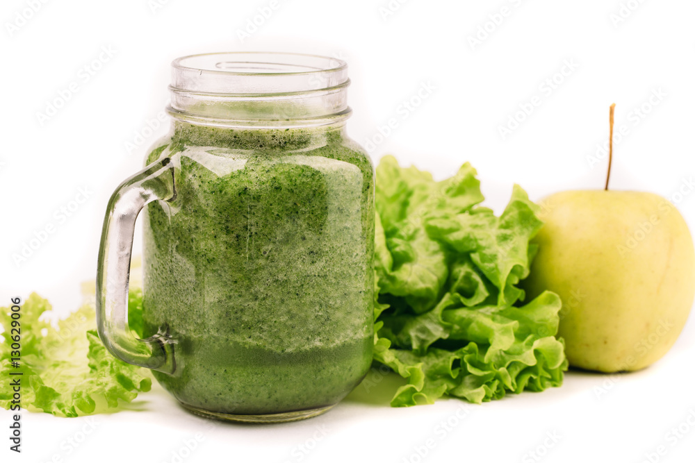 Fresh green smoothie isolated on white background. Superfood, detox and healthy food. Fresh green smoothie isolated on white background. Superfood, detox and healthy food.