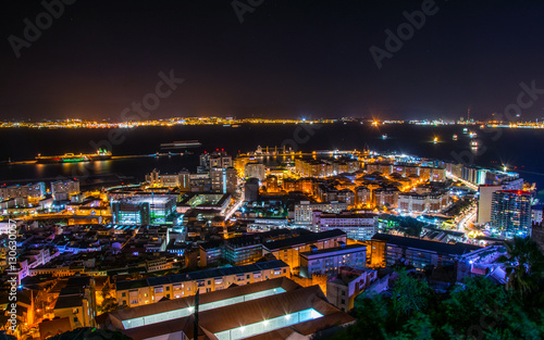 night view of illuminated gibraltar and algeciras bay