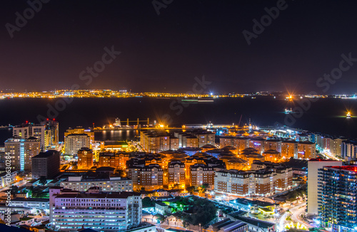 night view of illuminated gibraltar and algeciras bay