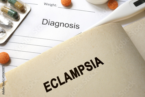 Page with word eclampsia and glasses.  photo