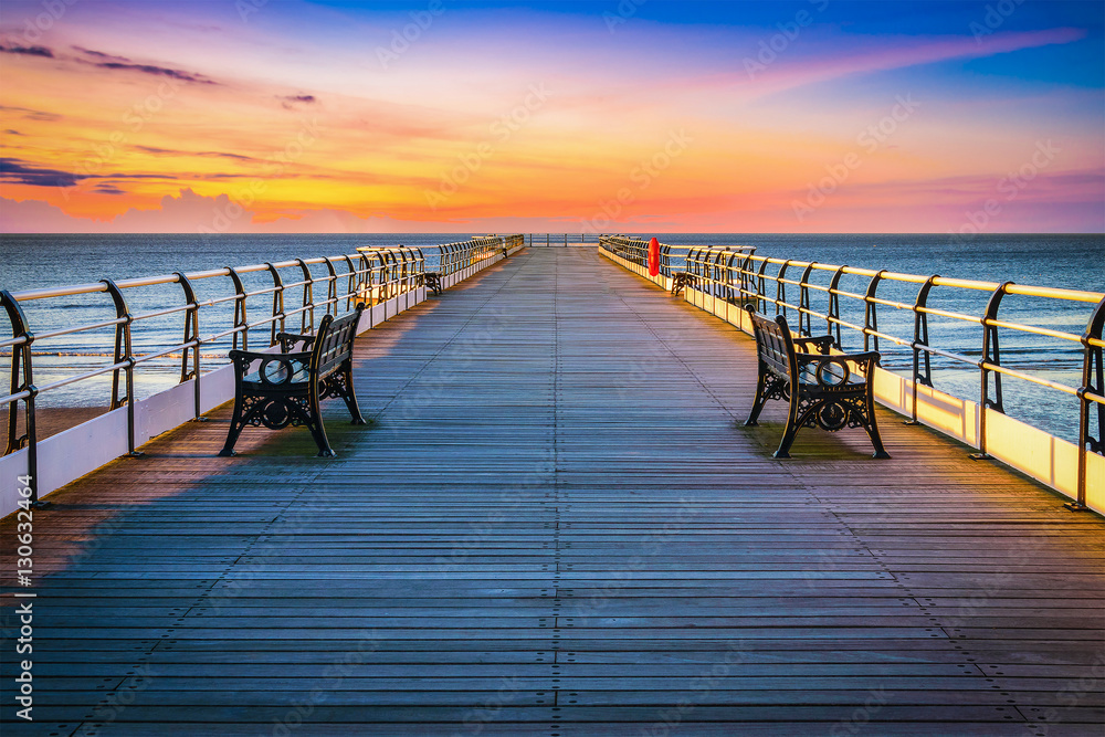 Naklejka premium Sunset pier at Saltburn by the Sea, North Yorkshire, UK
