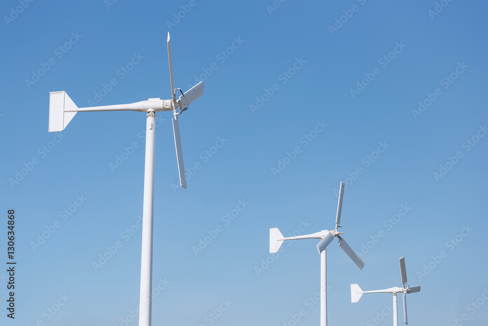 Three wind turbine on blue sky Three wind turbine on blue sky