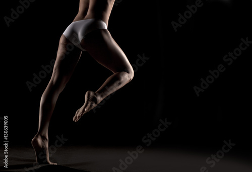 Fototapeta Naklejka Na Ścianę i Meble -  back view of elegant, beautifully shaped and cared woman's legs