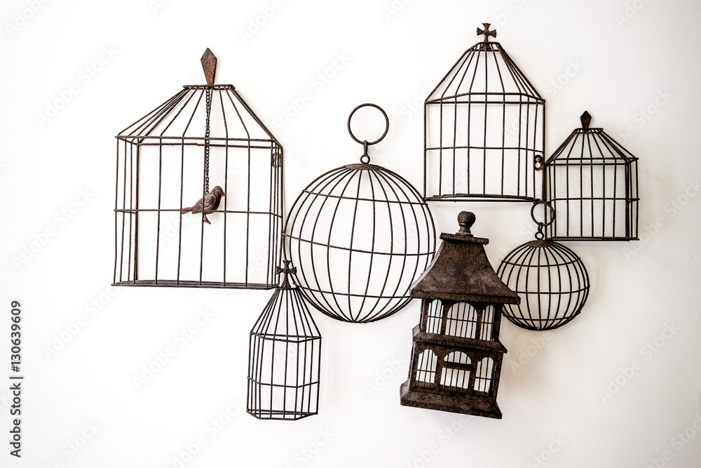 Bird cages hanging on the wall Bird cages hanging on the wall