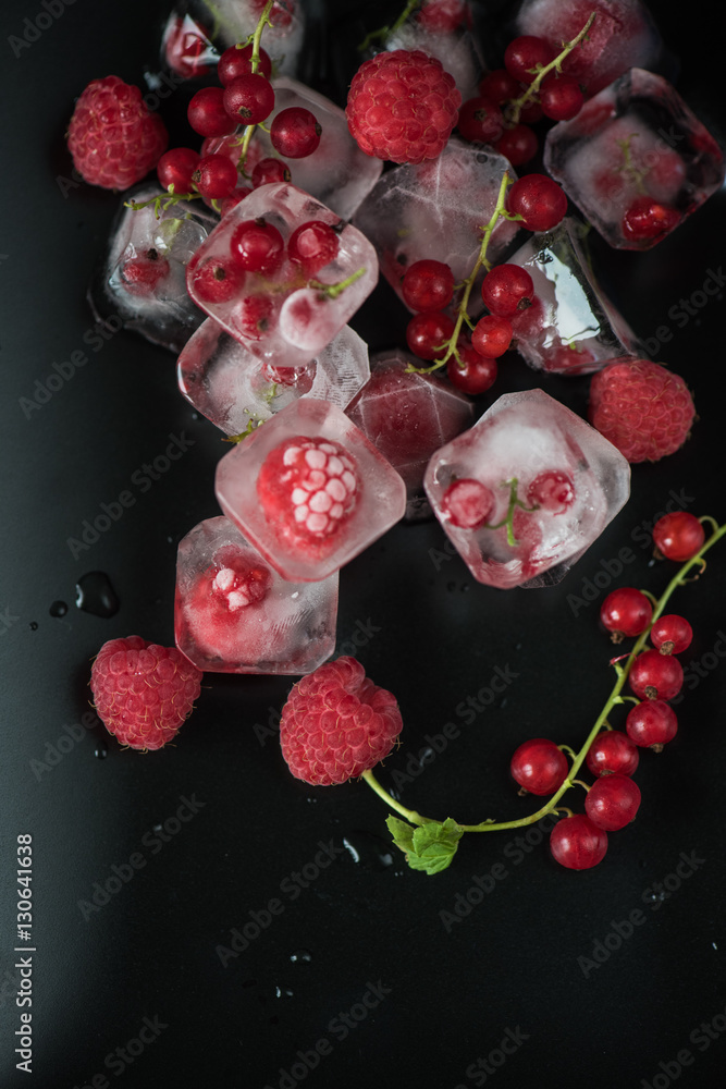 Frozen berries on wooden table Frozen berries on wooden table