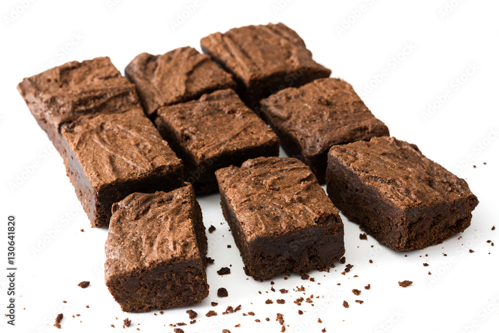 Chocolate brownie with chocolate syrup isolated on white background
Chocolate brownie with chocolate syrup isolated on white background