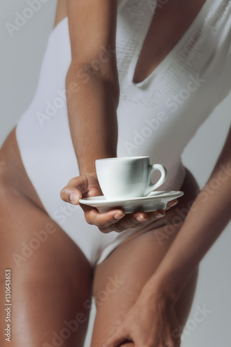 Beautiful girl with a cup of coffee