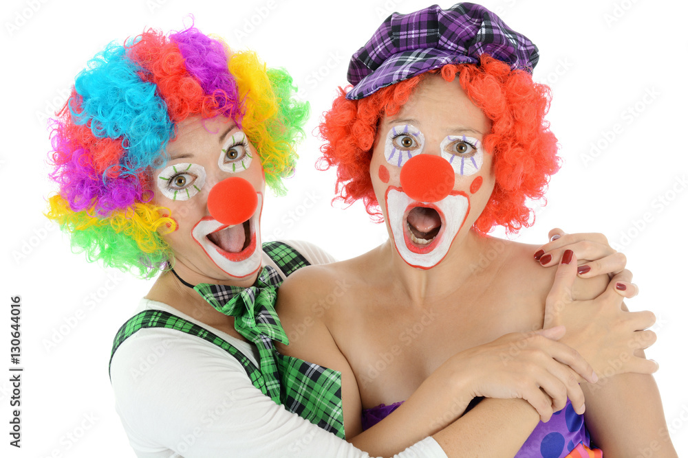 Clown geschminkt in Kostüm zu Karneval, Fasching oder Fastnacht Clown geschminkt in Kostüm zu Karneval, Fasching oder Fastnacht
