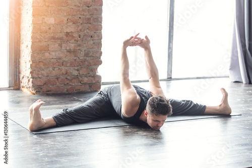 Mexican yoga teacher meditating photo