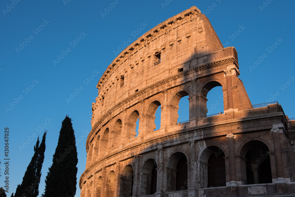 Rome Colosseum detail lit by sunset