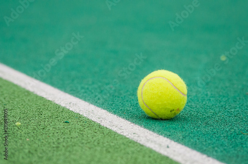 Tennis ball on court © tadeas