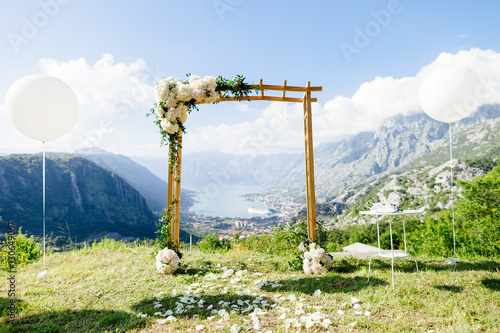 destination wedding arch with decoration photo