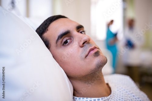 Close-up of patient lying on bed