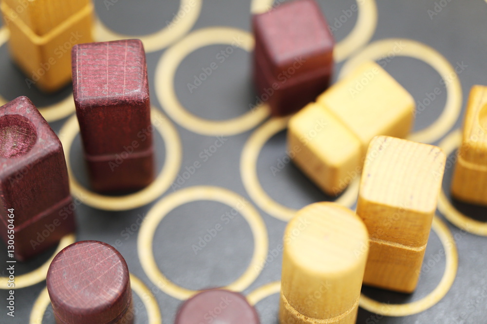 Close-Up Of Rolling Dices On Wooden Table Close-Up Of Rolling Dices On Wooden Table