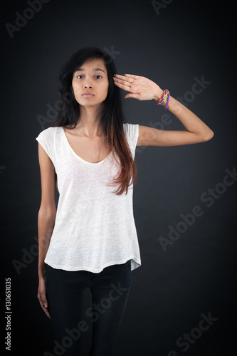 Wallpaper Mural Beautiful woman doing different expressions in different sets of clothes: at attention Torontodigital.ca