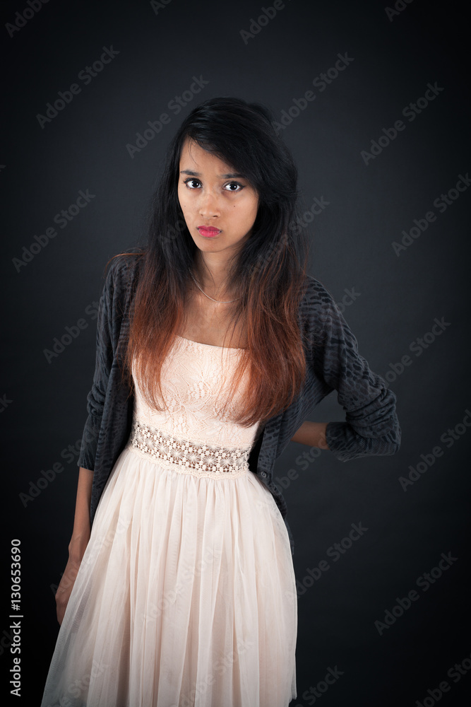 Beautiful woman doing different expressions in different sets of clothes: angry Beautiful woman doing different expressions in different sets of clothes: angry