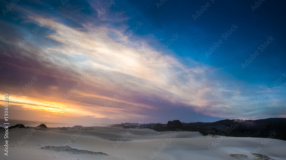 Sunset over the beach at Cannon Rocks