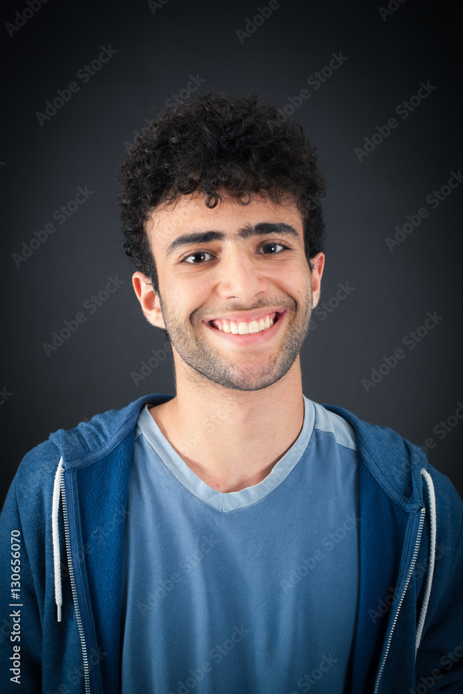 Obraz premium Handsome man doing different expressions in different sets of clothes: smile