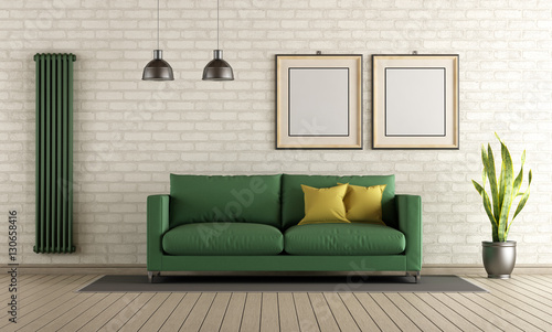Modern living room with green sofa