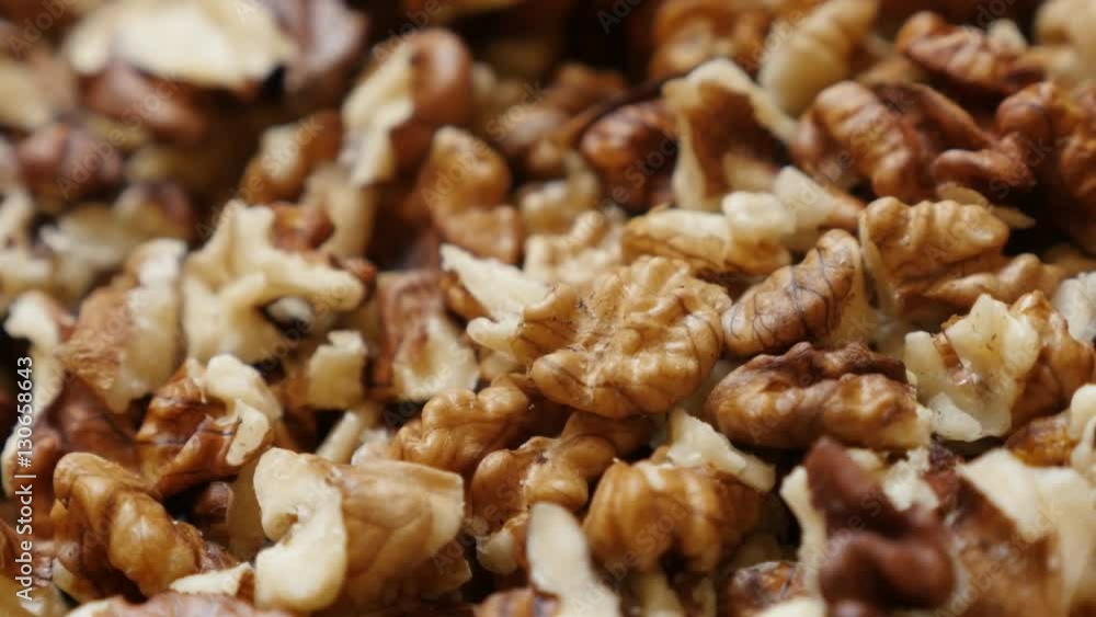 Juglans regia brown pieces shallow DOF 4K 2160p 30fps UltraHD pan footage - Healthy walnut out its shell food pile background 3840X2160 UHD panning video Juglans regia brown pieces shallow DOF 4K 2160p 30fps UltraHD pan footage - Healthy walnut out its shell food pile background 3840X2160 UHD panning video
