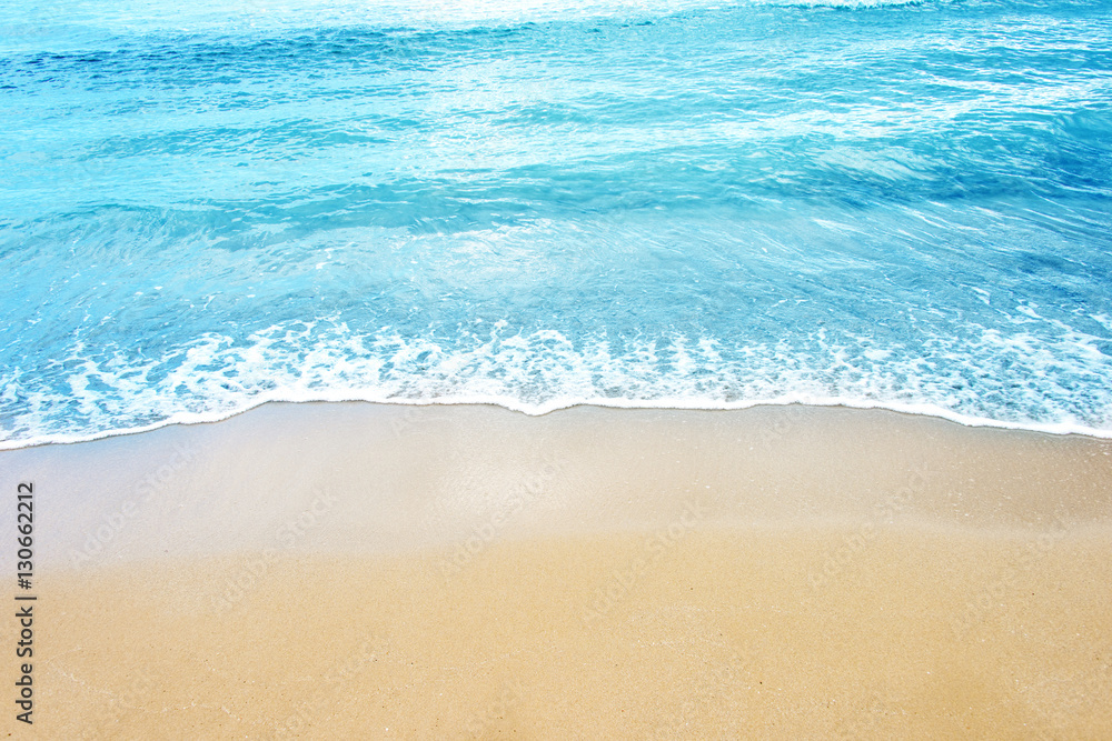 Soft wave of ocean on the sandy beach