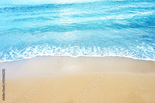 Soft wave of ocean on the sandy beach © 26max