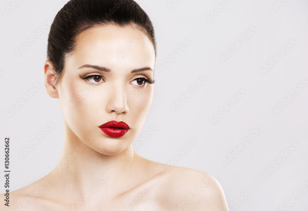 fashion woman with perfect skin wearing dramatic makeup