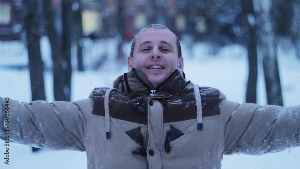 young man enjoying winter day outdoors. snow winter dream. happy happiness young man enjoying winter day outdoors. snow winter dream. happy happiness
