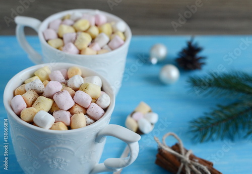 Hot chocolate with marshmallows and Christmas decorations