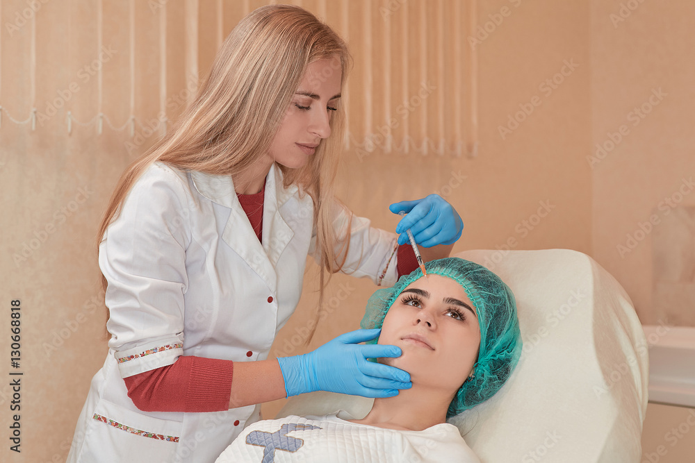 Beautiful woman gets injections. Cosmetology. Beauty Face Beautiful woman gets injections. Cosmetology. Beauty Face