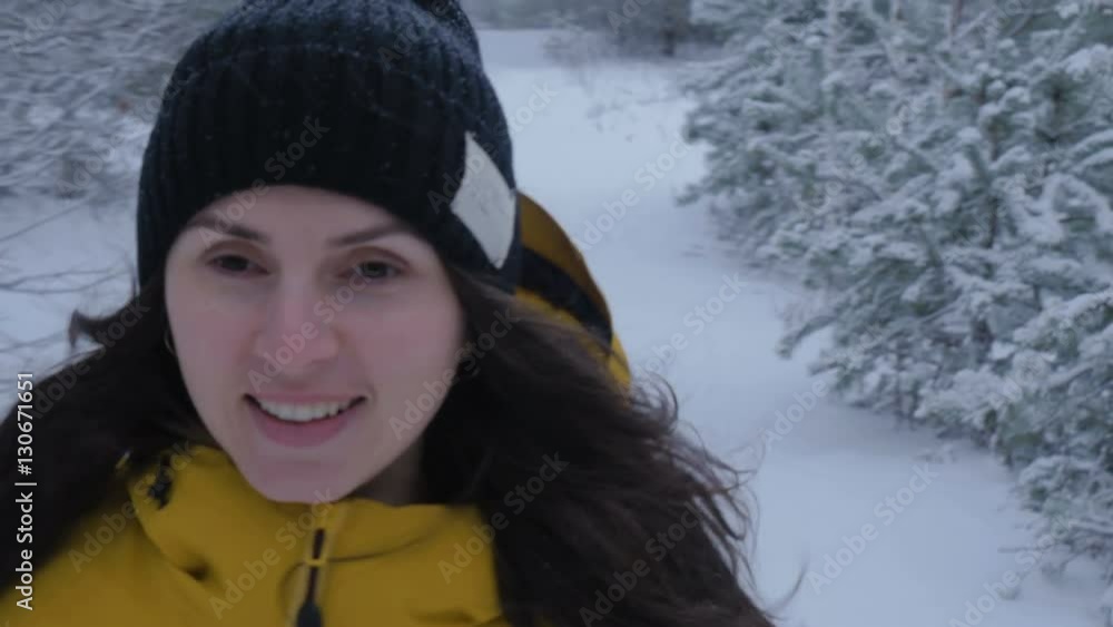 Woman pull a sled with a child in winter Park. Steadicam motion, 4K Woman pull a sled with a child in winter Park. Steadicam motion, 4K