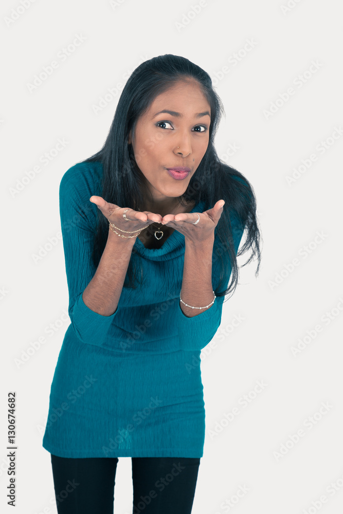 Beautiful woman doing different expressions in different sets of clothes: kiss Beautiful woman doing different expressions in different sets of clothes: kiss