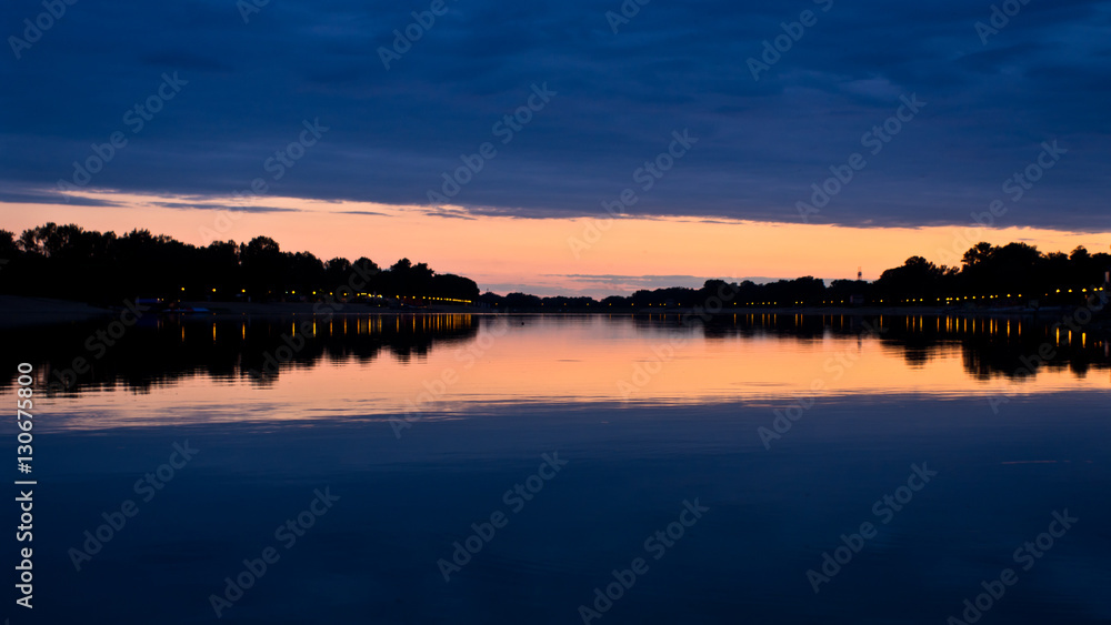 Evening clouds and its reflection in a lake Ada, Belgrade, Serbia