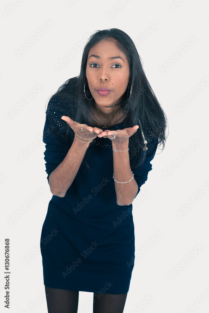 Beautiful woman doing different expressions in different sets of clothes: kiss Beautiful woman doing different expressions in different sets of clothes: kiss