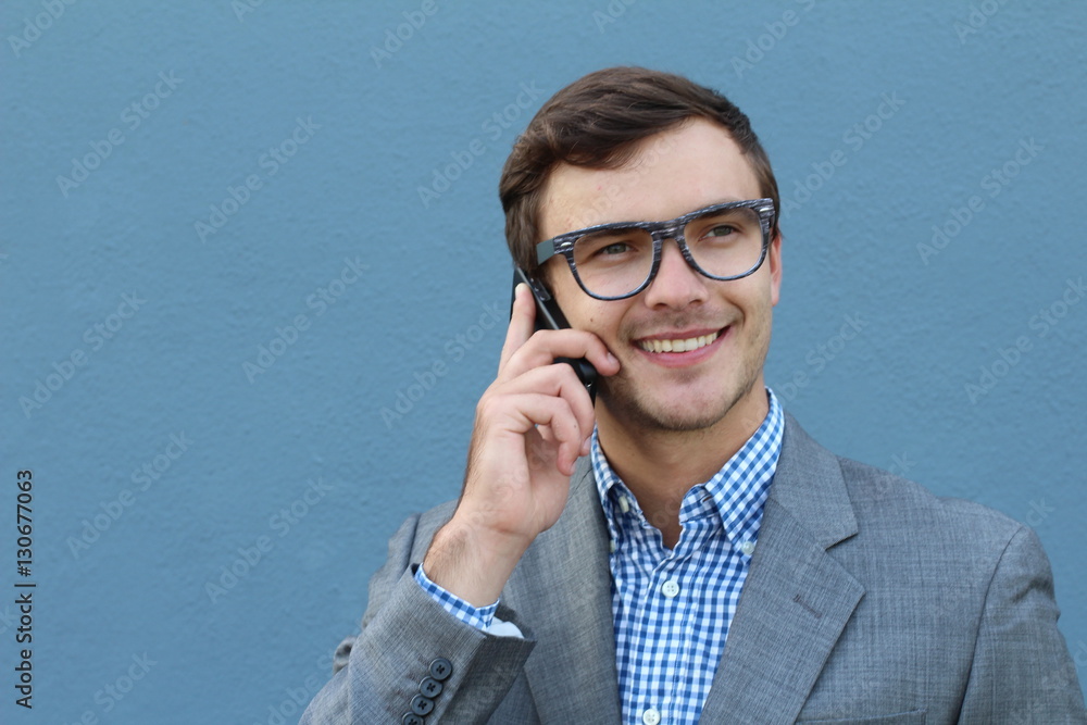 Businessman making a call outside