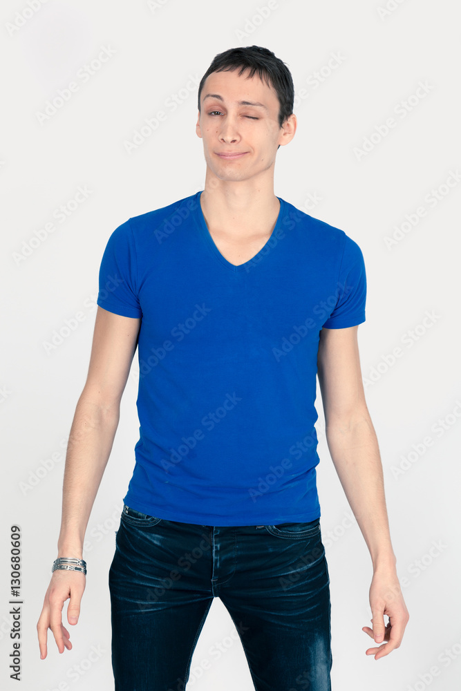 Handsome man doing different expressions in different sets of clothes: blink Handsome man doing different expressions in different sets of clothes: blink