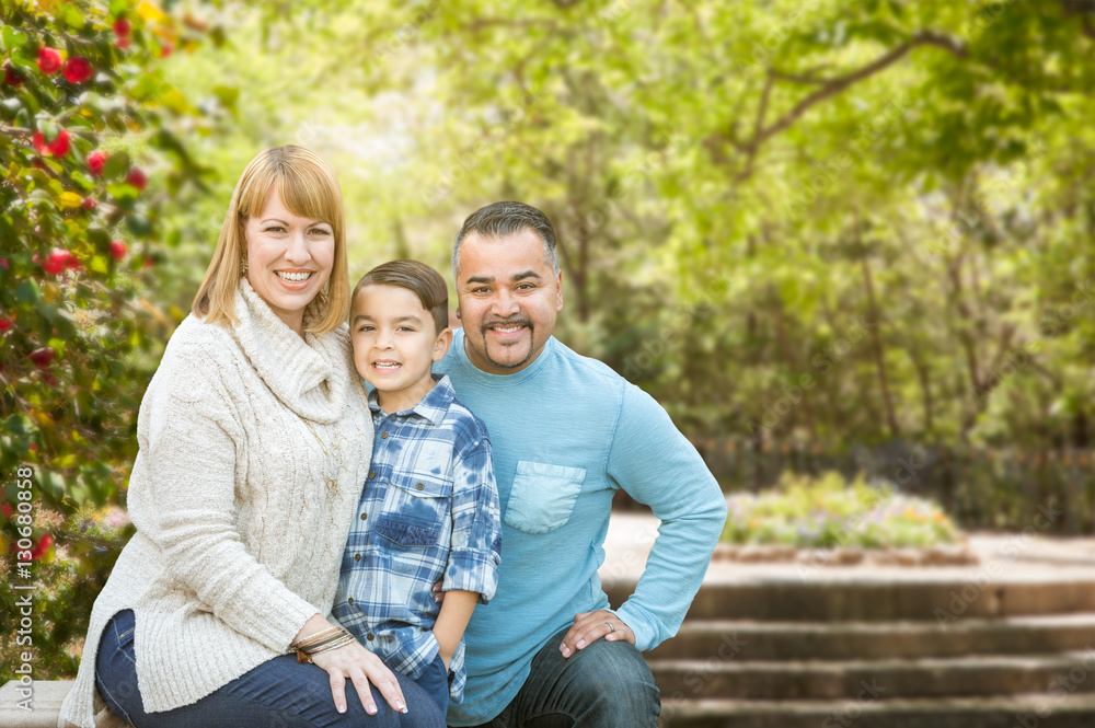 Happy Mixed Race Hispanic and Caucasian Family Portrait at the Park. Happy Mixed Race Hispanic and Caucasian Family Portrait at the Park.