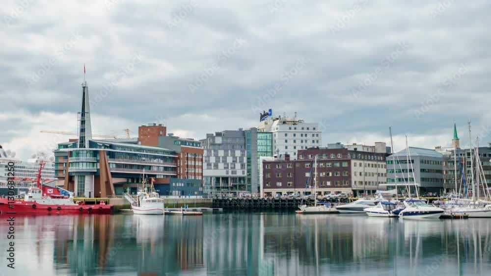 View of a marina in Tromso, North Norway timelapse. Tromso is considered the northernmost city in the world with a population above 50,000. View of a marina in Tromso, North Norway timelapse. Tromso is considered the northernmost city in the world with a population above 50,000.