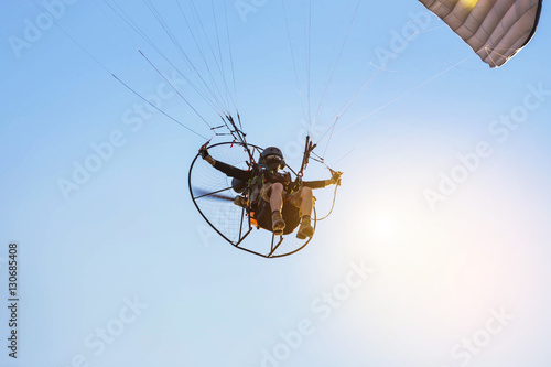 paraglider flying  with paramotor 