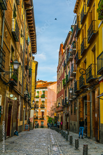 view of a narrow street in the center of madrid