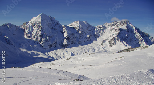 Snowy peaks in the European Alps © alexzappa