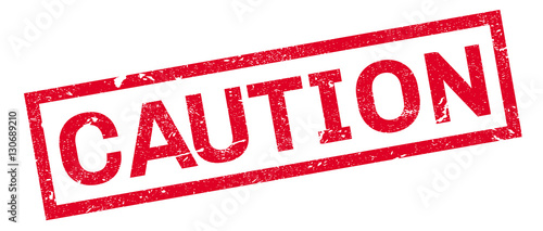 Caution rubber stamp. Grunge design with dust scratches. Effects can be easily removed for a clean, crisp look. Color is easily changed.