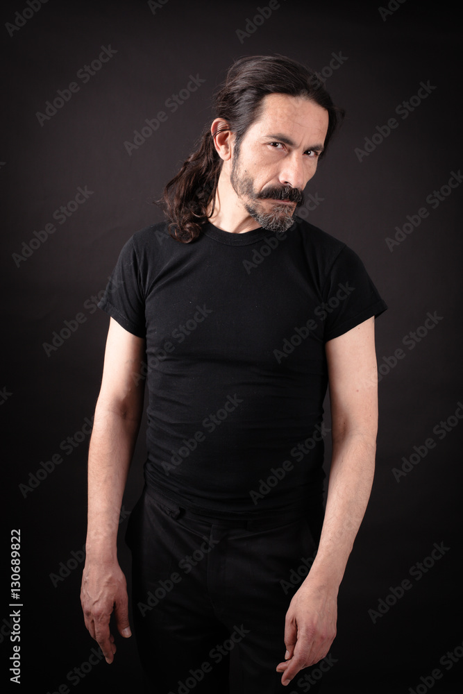 Handsome man doing different expressions in different sets of clothes: suspicion Handsome man doing different expressions in different sets of clothes: suspicion