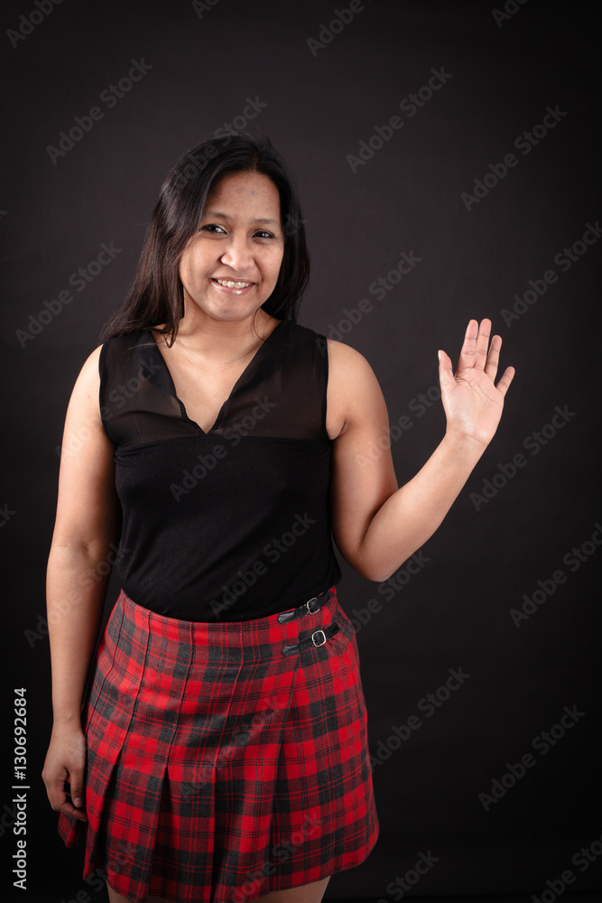 Beautiful woman doing different expressions in different sets of clothes: wave Beautiful woman doing different expressions in different sets of clothes: wave