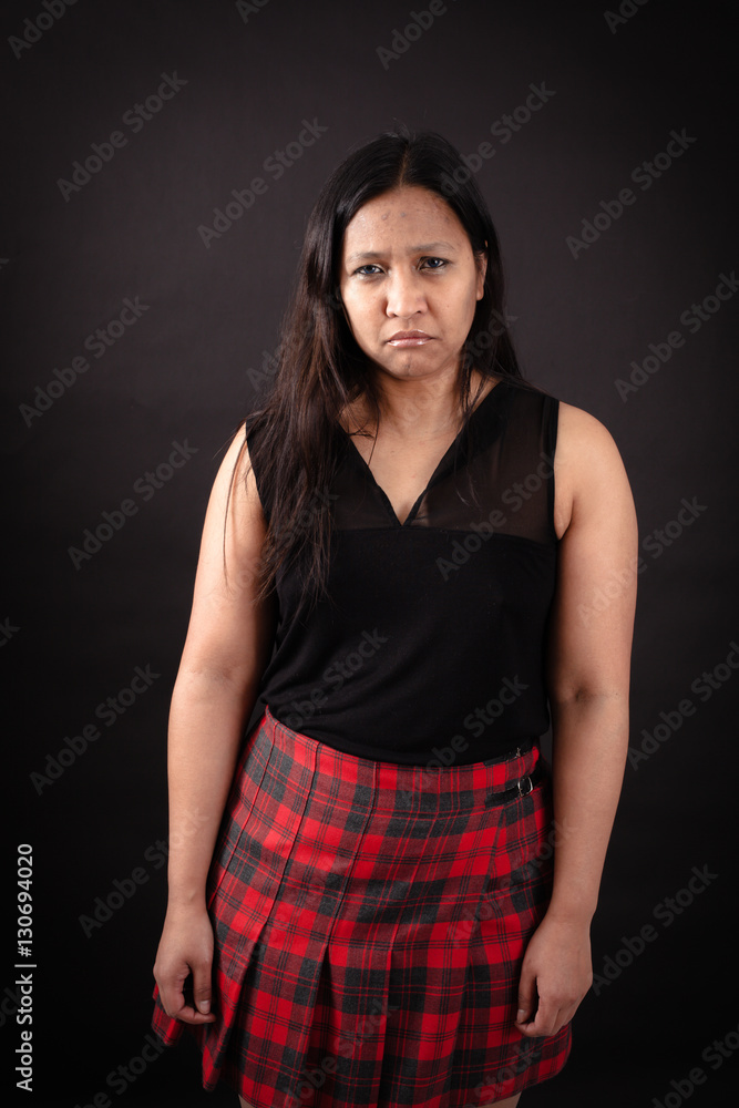 Beautiful woman doing different expressions in different sets of clothes: sad Beautiful woman doing different expressions in different sets of clothes: sad